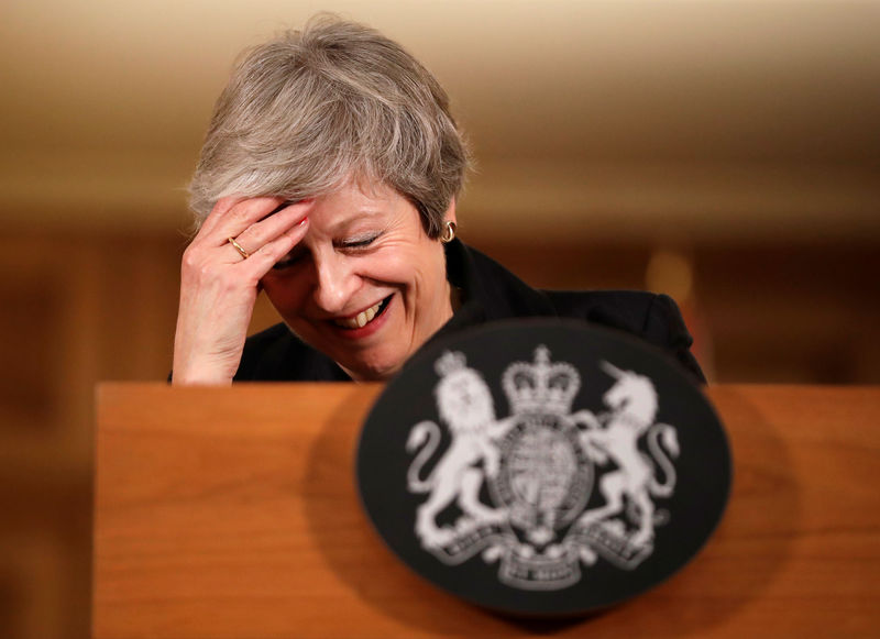 © Reuters. Britain's Prime Minister Theresa May reacts during a news conference at Downing Street in London