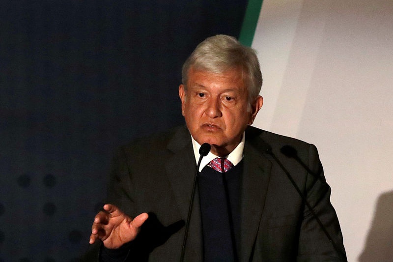 © Reuters. President-elect Andres Lopez Obrador talks about his security plan to the media in Mexico City