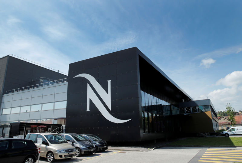 © Reuters. A Nespresso logo is pictured on a coffee factory at Nestle in Orbe