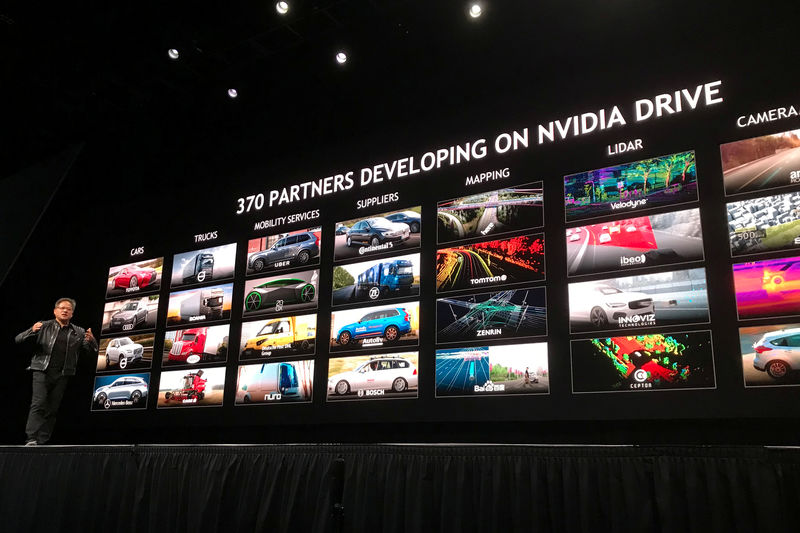 © Reuters. Presidente-executivo da Nvidia , Jensen Huang, fala na conferência GPU Nvidia 2018 em San Jose