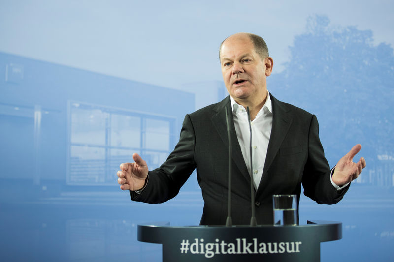 © Reuters. German Finance Minister Olaf Scholz attends a press conference after the federal cabinet meeting in Potsdam