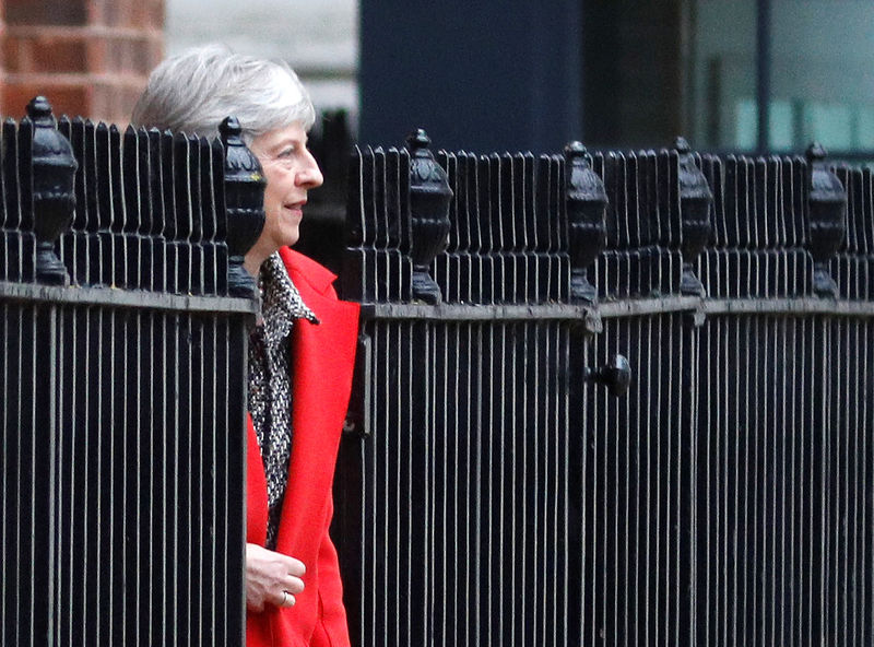 © Reuters. Britain's Prime Minister Theresa May leaves 10 Downing Street via the back exit in London