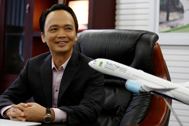 © Reuters. Vietnam's Bamboo Airways Chairman Trinh Van Quyet is seen at his office in Hanoi