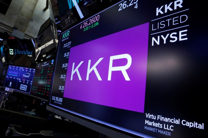 © Reuters. FILE PHOTO:  Trading information for KKR & Co is displayed on a screen on the floor of the NYSE in New York