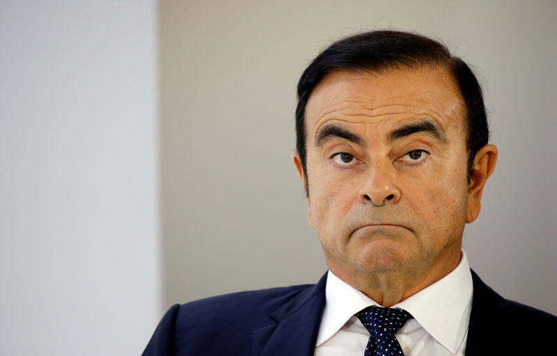 © Reuters. FILE PHOTO: Carlos Ghosn, chairman and CEO of the Renault-Nissan-Mitsubishi Alliance, attends a press conference on the second press day of the Paris auto show, in Paris