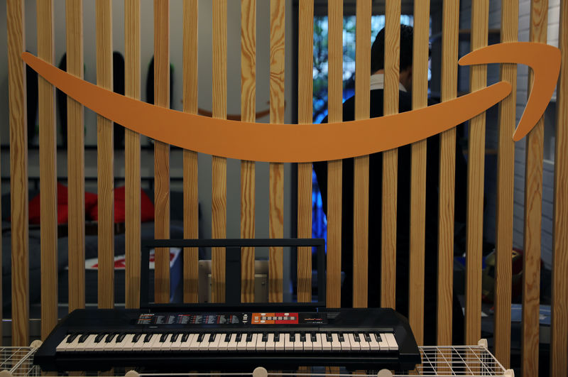 © Reuters. A logo of Amazon is seen above an electronic keyboard during the presentation of the company's first pop-up store in Spain, in an old building in one of prime shopping districts in Madrid