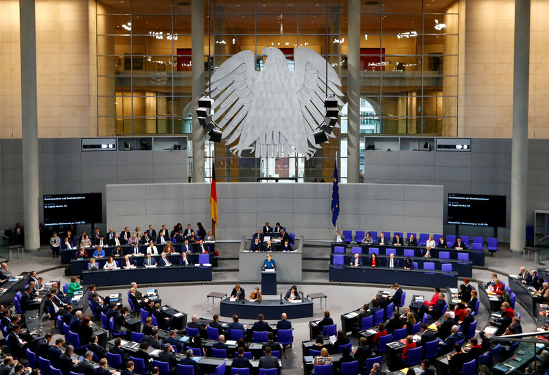 © Reuters. German Chancellor Angela Merkel speaks during a session at the lower house of parliament Bundestag in Berlin