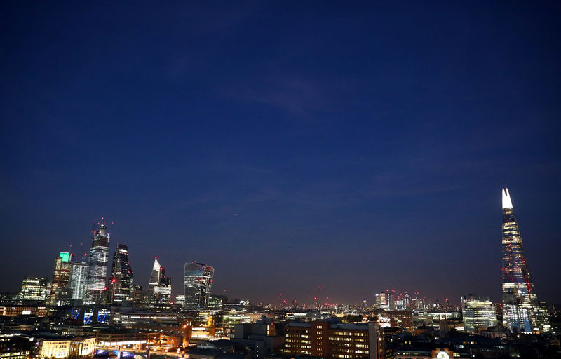 © Reuters. General view of the financial district and The Shard skyscraper in London