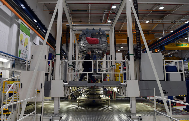 © Reuters. FILE PHOTO: Rolls Royce Trent XWB engines, designed specifically for the Airbus A350 family of aircraft, are seen on the assembly line at the Rolls Royce factory in Derby