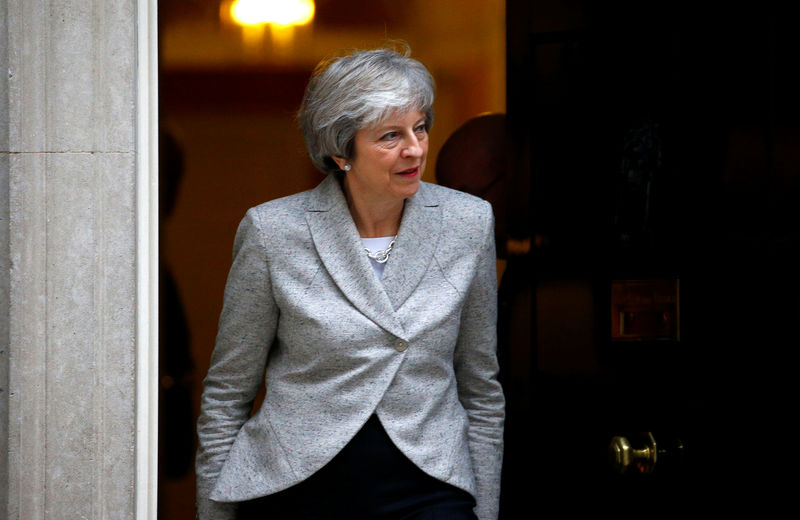 © Reuters. Britain's Prime Minister Theresa May walks out of 10 Downing Street in London