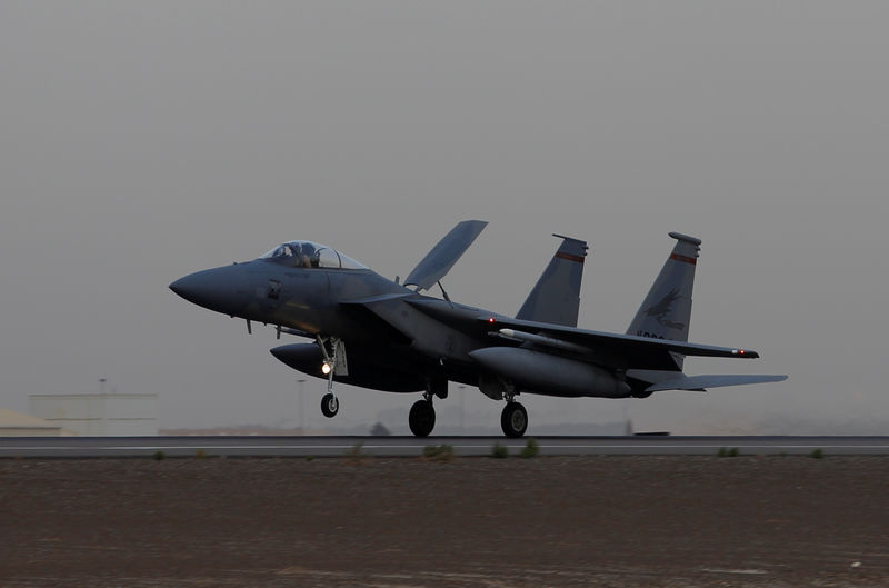 © Reuters. FILE PHOTO: A US Air Force F-15 lands after completing a regional exercise at an base in the Gulf