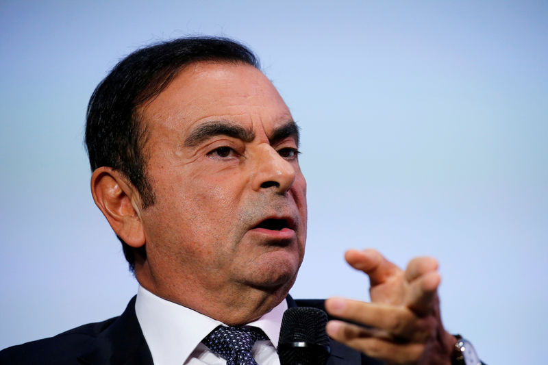 © Reuters. FILE PHOTO: Carlos Ghosn, chairman and CEO of the Renault-Nissan-Mitsubishi Alliance, speaks at the Tomorrow In Motion event on the eve of press day at the Paris Auto Show, in Paris