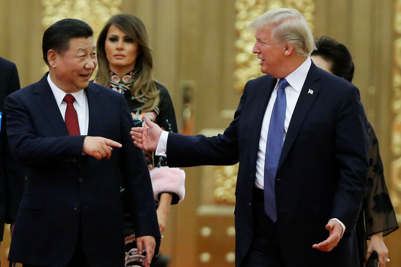 © Reuters. Trump e Xi Jinping em Pequim