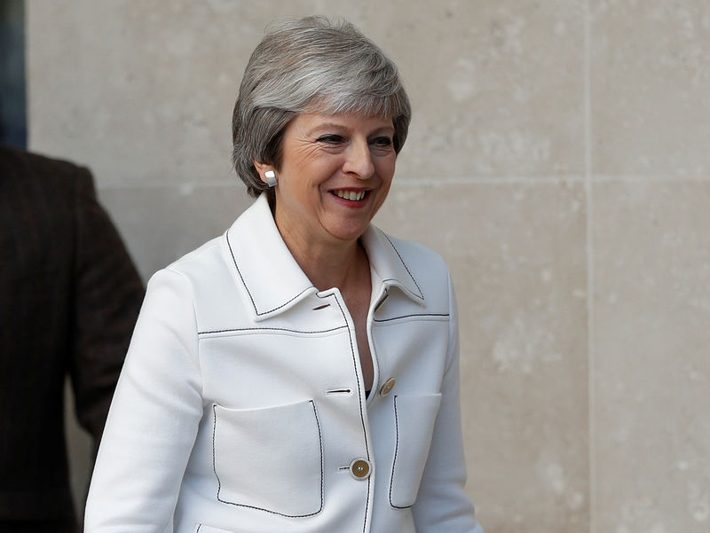 © Reuters. Britain's Prime Minister, Theresa May, leaves the BBC after appearing on the Andrew Marr Show, in central London