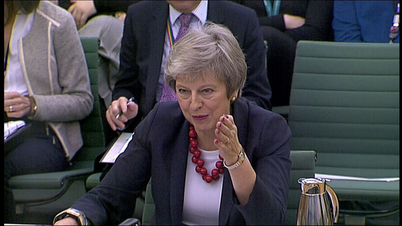 © Reuters. A still image from video footage shows Britain's Prime Minister, Theresa May, speaking at a Select Committee hearing, in London