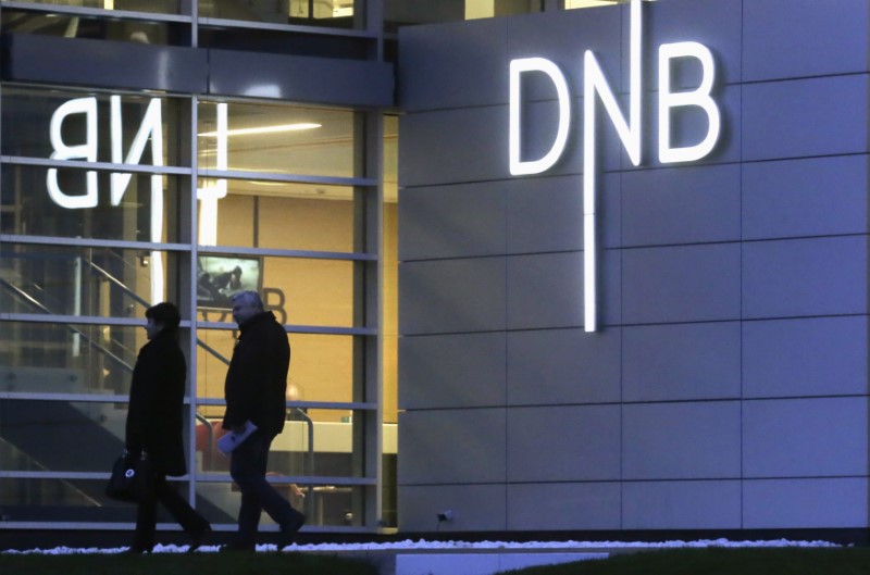 © Reuters. People leave DNB bank's local office in Riga