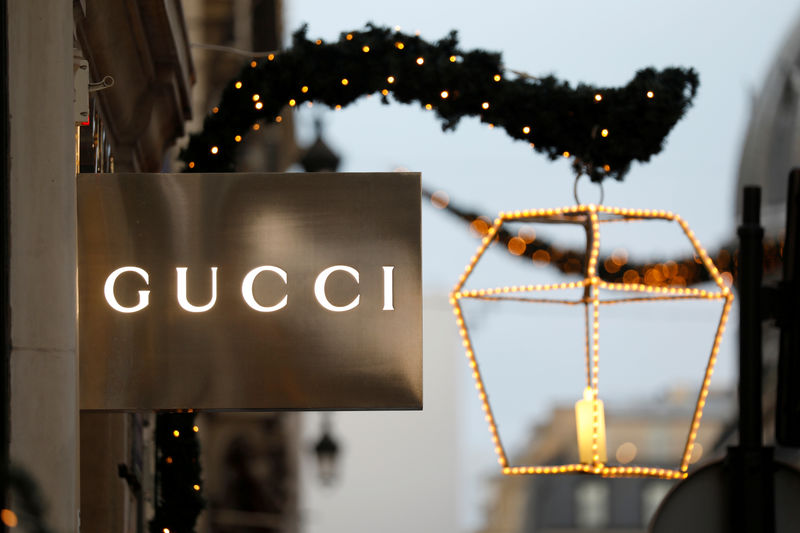 © Reuters. FILE PHOTO: A Gucci sign is seen outside a shop in Paris