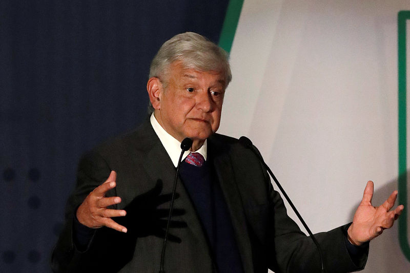 © Reuters. President-elect Lopez Obrador talks about his security plan to the media in Mexico City