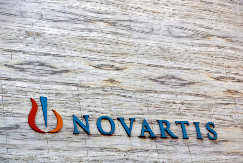 © Reuters. FILE PHOTO: A Novartis logo is pictured on its headquarters building in Mumbai