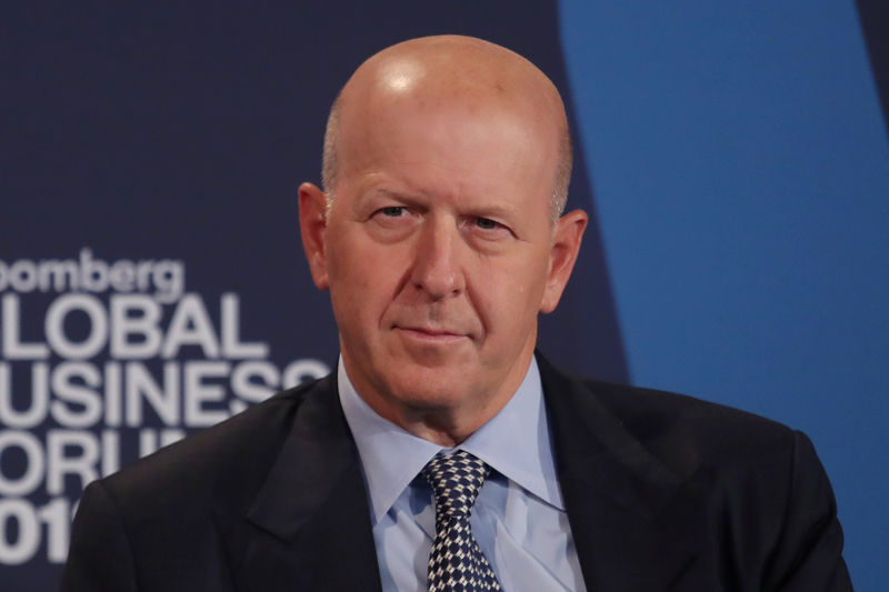 © Reuters. David Solomon, president and chief operating officer of Goldman Sachs, listens at the Bloomberg Global Business forum in New York