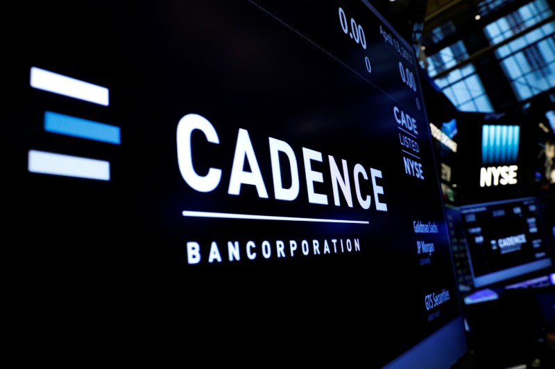 © Reuters. A logo and ticker info for Cadence Bancorp, LLC  is displayed on a screen during the company's IPO, on the floor of the NYSE
