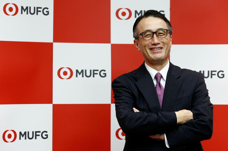 © Reuters. President and CEO of the Bank of Tokyo-Mitsubishi UFJ Kanetsugu Mike poses during an interview in Tokyo