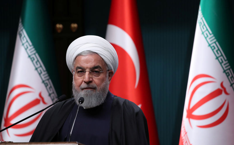 © Reuters. Iranian President Rouhani speaks during a joint news conference in Ankara