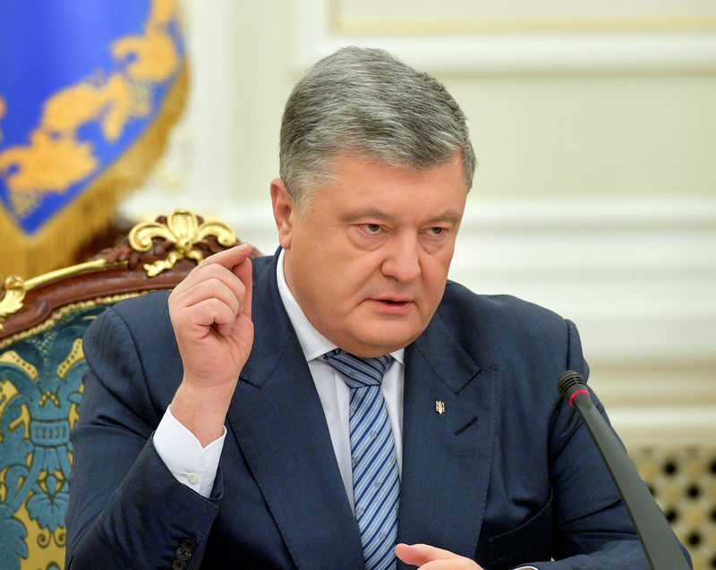 © Reuters. بوروشينكو: انتهاء العمل بالأحكام العرفية في أوكرانيا الأربعاء