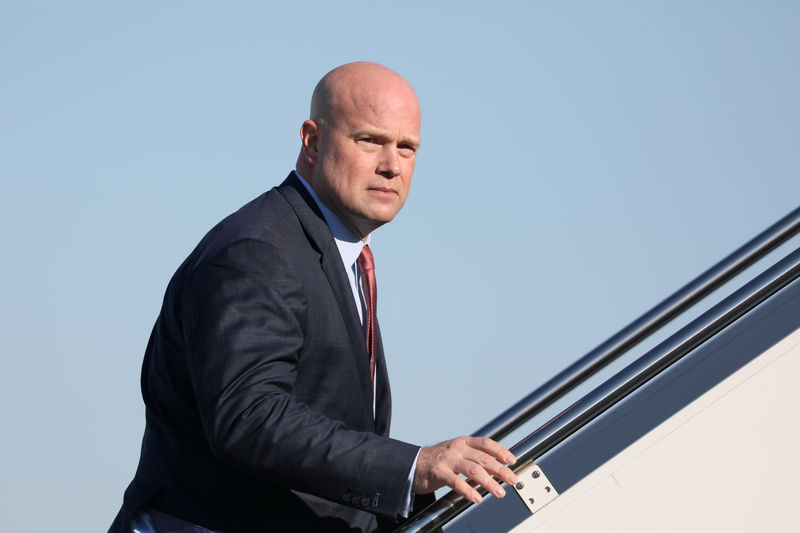 © Reuters. FILE PHOTO: U.S. Acting Attorney General Whitaker boards Air Force One for travel to Kansas City with U.S. President Trump from Joint Base Andrews, Maryland