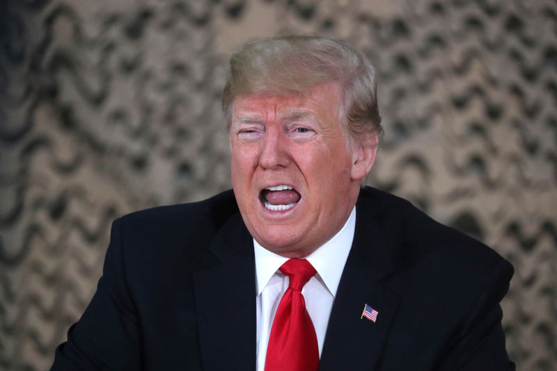 © Reuters. U.S. President Trump speaks to reporters as he meets U.S. political and military leaders during an unannounced visit to Al Asad Air Base, Iraq