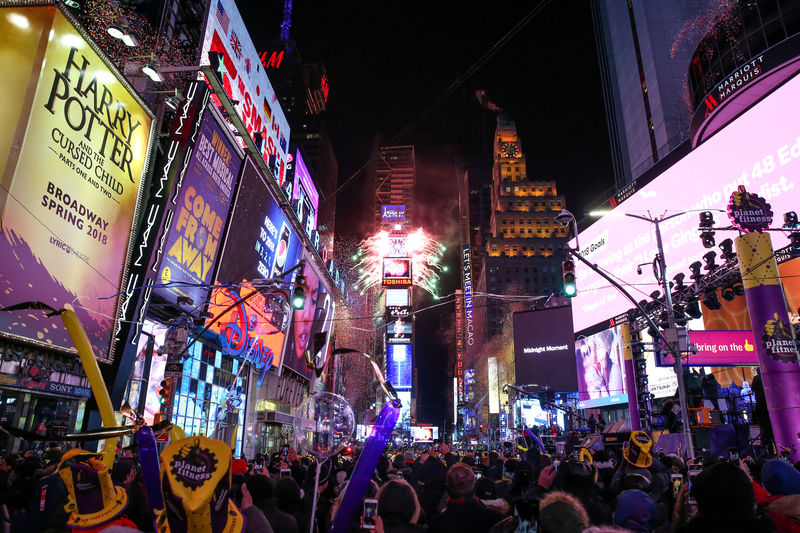 © Reuters. FILE PHOTO: Revelers celebrate the New Year's Eve in Times Square in New York