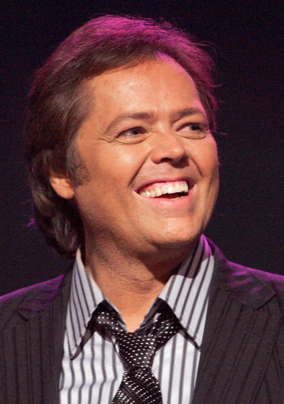 © Reuters. FILE PHOTO: Jimmy Osmond smiles during an Osmond 50th anniversary show at the Orleans hotel-casino in Las Vegas