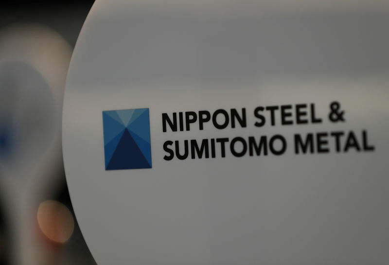 © Reuters. The logo of Nippon Steel & Sumitomo Metal Corp.'s Kimitsu steel plant is pictured at its exhibition hall in Kimitsu