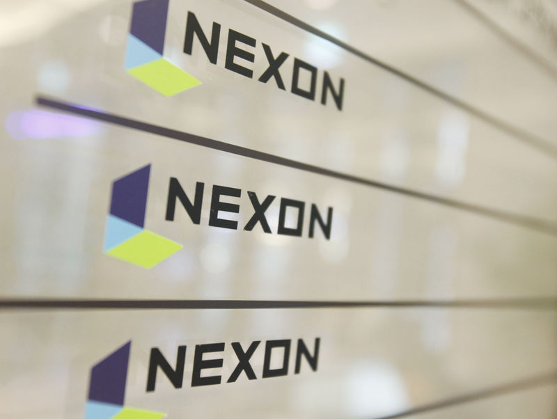 © Reuters. FILE PHOTO:  Logos of Nexon are seen at its main office building in Seoul