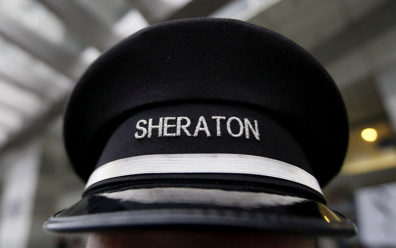 © Reuters. FILE PHOTO: File photo of a doorman's hat at Sheraton hotel, a brand of Starwood Hotels & Resorts Worldwide, in Warsaw