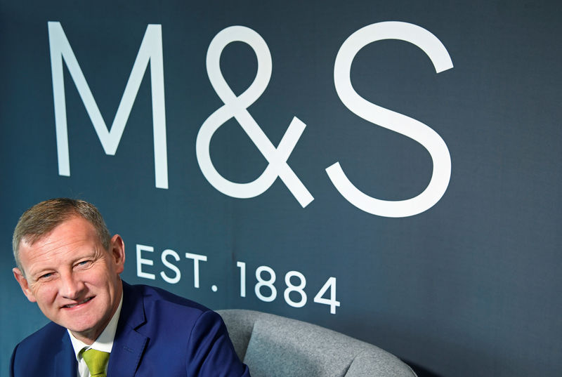 © Reuters. FILE PHOTO: Rowe, CEO of Marks and Spencer, poses for a photograph at the company head office in London, Britain