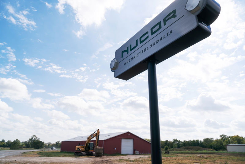 © Reuters. A sign for the Nucor Steel Mill, under construction, is seen in Sedalia