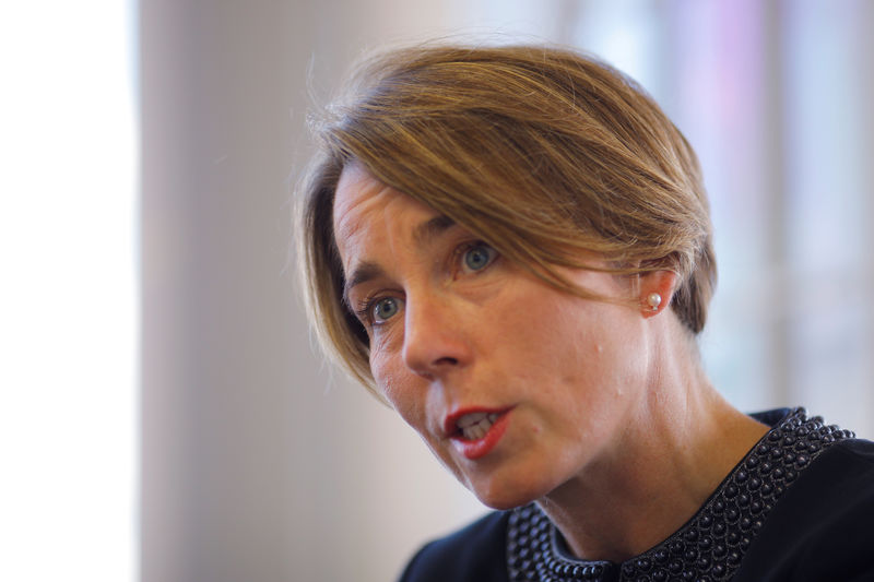 © Reuters. FILE PHOTO: Massachusetts Attorney General Maura Healey answers a question during an interview with Reuters at her office in Boston