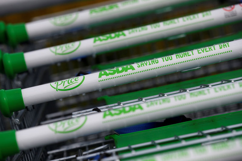 © Reuters. FILE PHOTO: Shopping trolleys a branch of ASDA in Altrincham