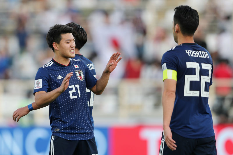 © Reuters. اليابان تحول تأخرها أمام تركمانستان للانتصار 3-2 في كأس آسيا