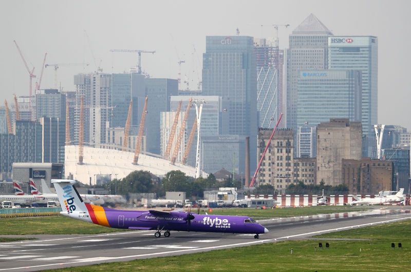 © Reuters. A Flybe Bombardier Dash 8 Q400 airplane taxis at City Airport in London