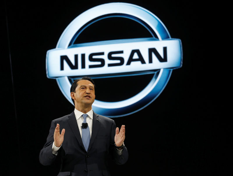© Reuters. FILE PHOTO: Jose Munoz, Chairman of Nissan North America, speaks during the North American International Auto Show in Detroit