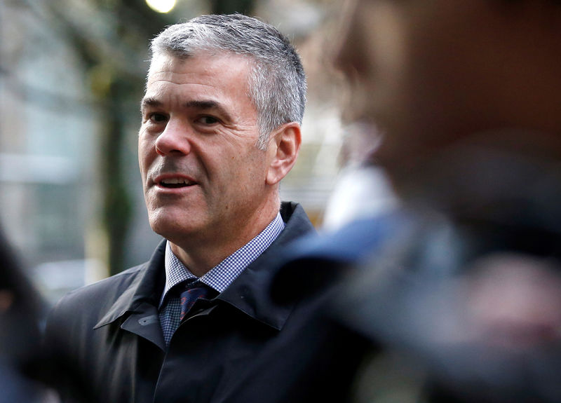 © Reuters. FILE PHOTO: Huawei Canada Vice President of Corporate Affairs Bradley stands outside after the B.C. Supreme Court bail hearing of Huawei CFO Meng in Vancouver