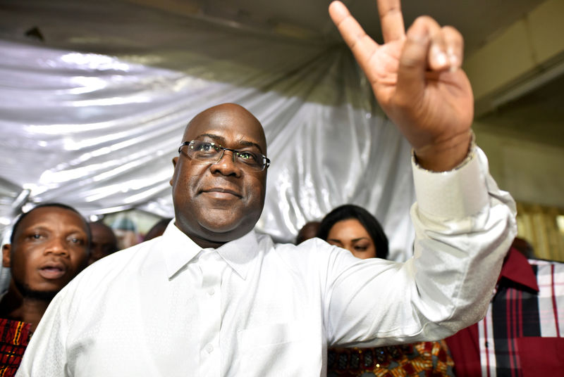 © Reuters. FILE PHOTO: Felix Tshisekedi, leader of the Congolese main opposition party, the Union for Democracy and Social Progress who was announced as the winner of the presidential elections gestures to his supporters at party headquarters in Kinshasa