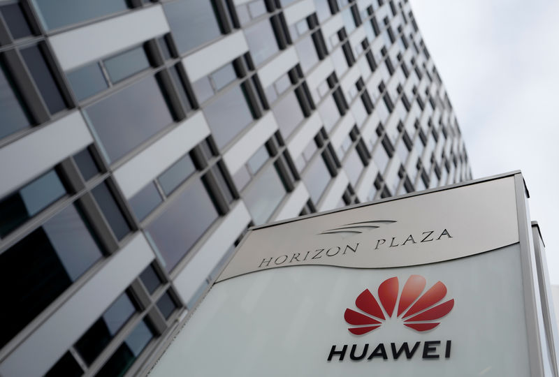 © Reuters. FILE PHOTO: Logo of Huawei is seen in front of the local offices of Huawei in Warsaw