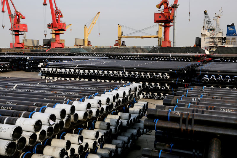 © Reuters. Steel pipes to be exported are seen at a port in Lianyungang