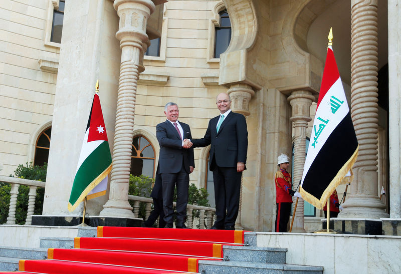 © Reuters. بعد بومبيو.. العاهل الأردني ووزيرا خارجية فرنسا وإيران يزورون العراق
