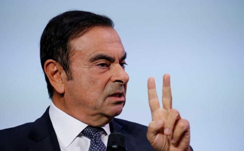 © Reuters. FILE PHOTO: Carlos Ghosn, chairman and CEO of the Renault-Nissan-Mitsubishi Alliance, attends the Tomorrow In Motion event on the eve of press day at the Paris Auto Show, in Paris