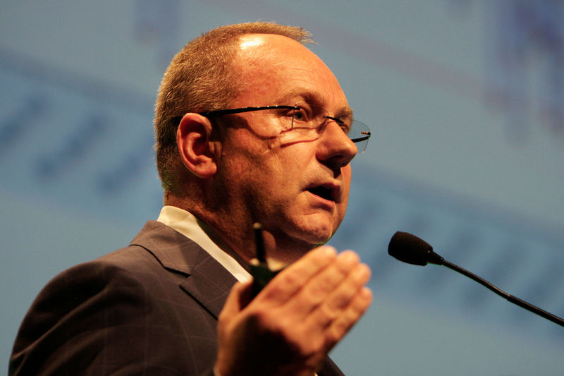 © Reuters. FILE PHOTO: Mark Cutifani speaks during an annual African mining conference in Cape Town