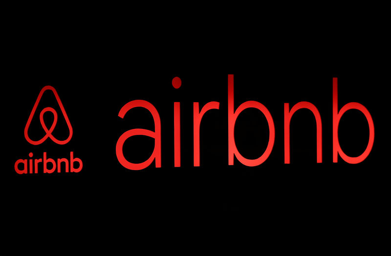© Reuters. The logos of Airbnb are displayed at an Airbnb event in Tokyo